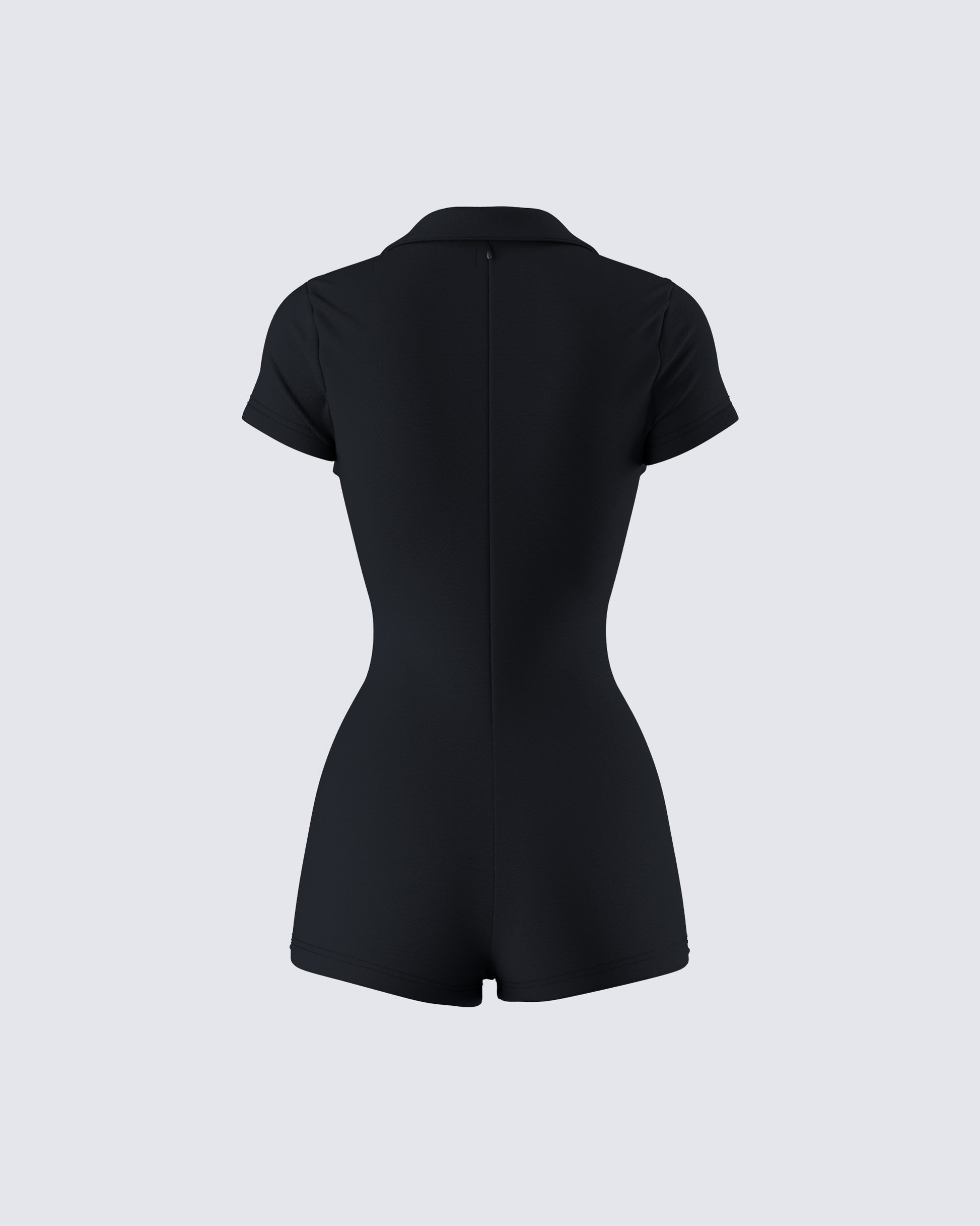 Women's black romper styled on model – FINESSE