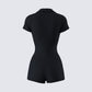 Women's black romper styled on model – FINESSE