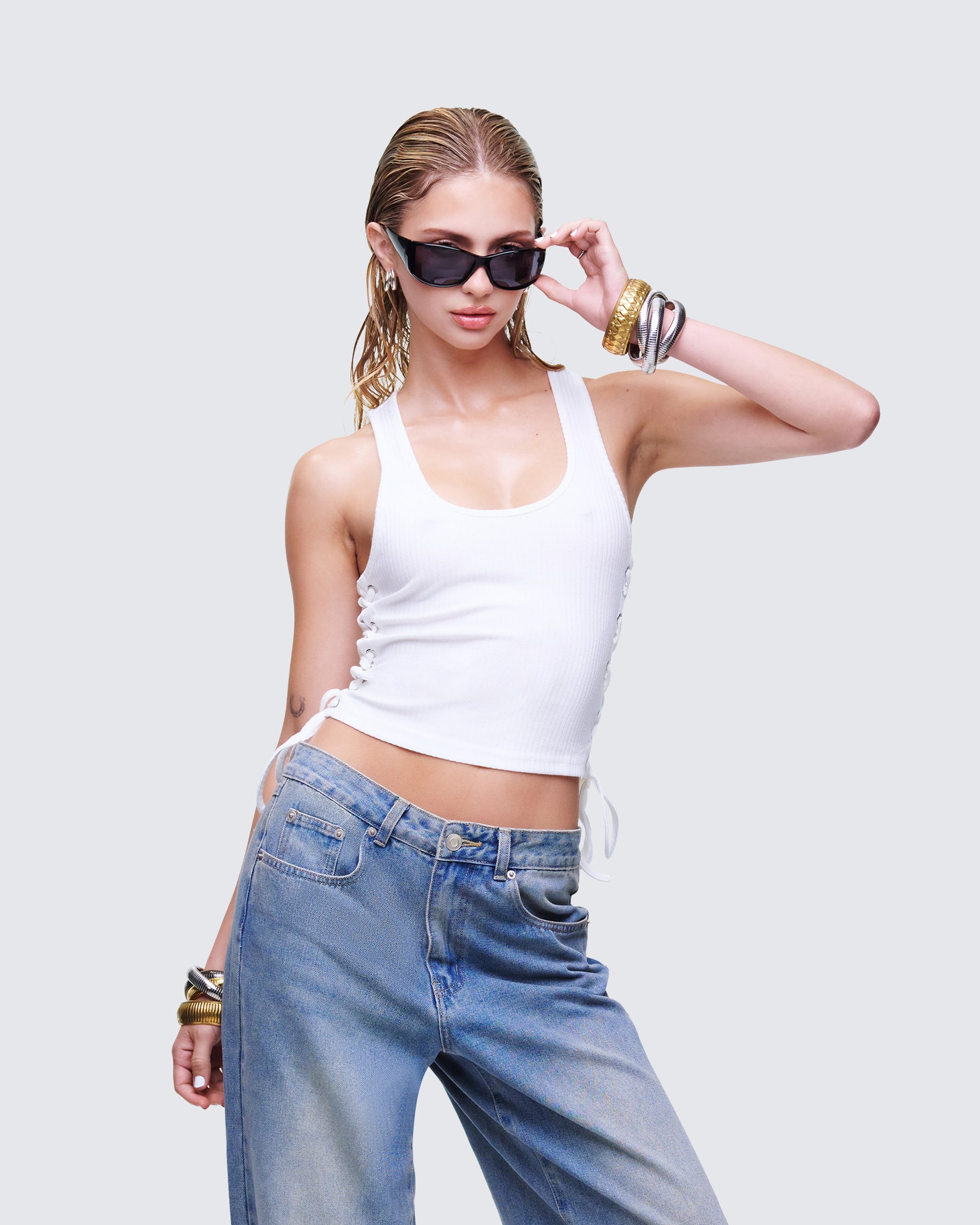 Women's white tank top styled on model – FINESSE