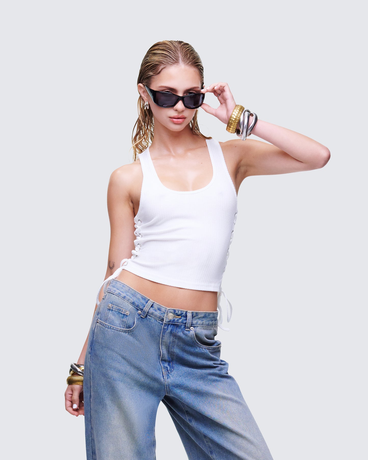 Women's white tank top styled on model – FINESSE