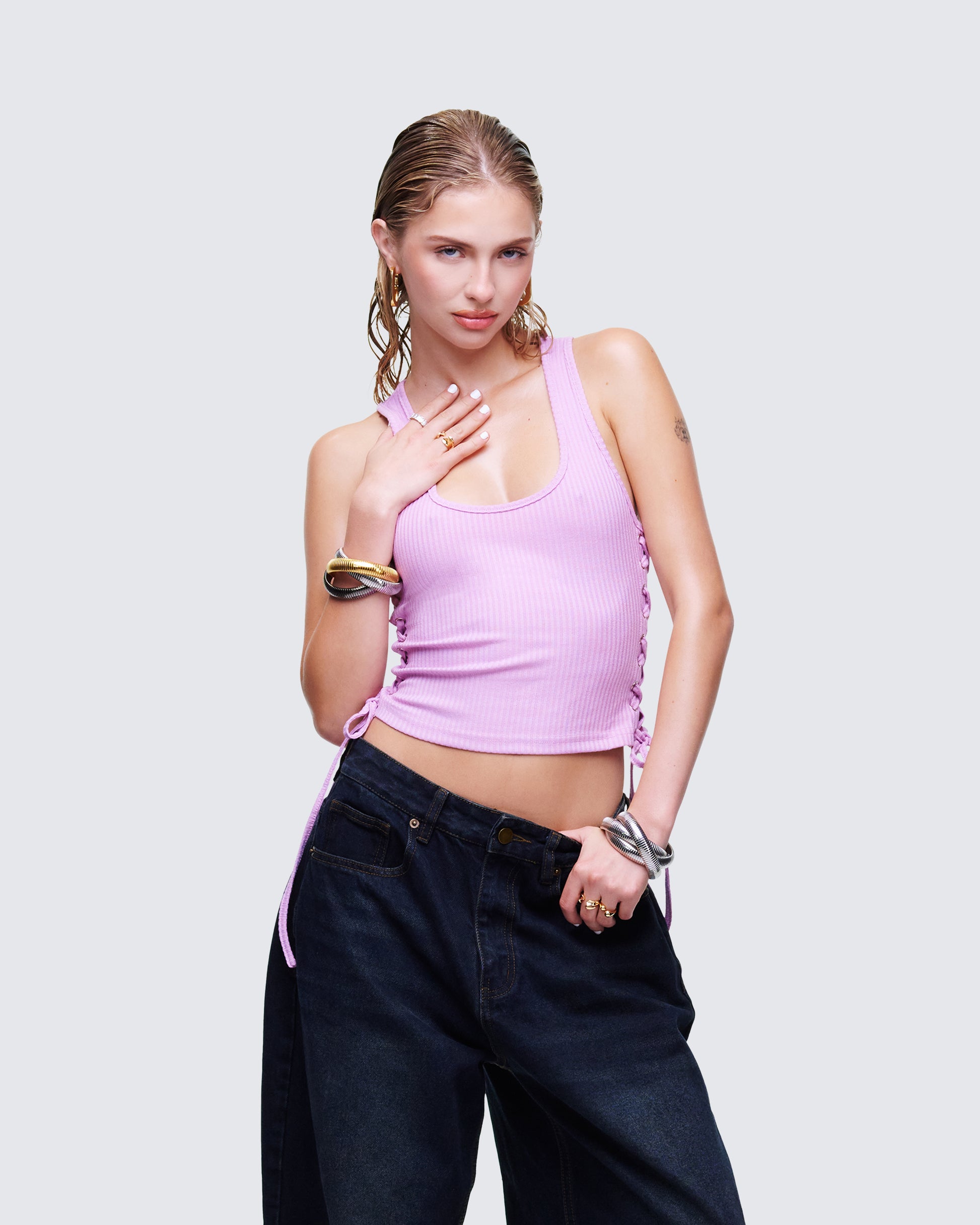Women's pink tank top styled on model – FINESSE