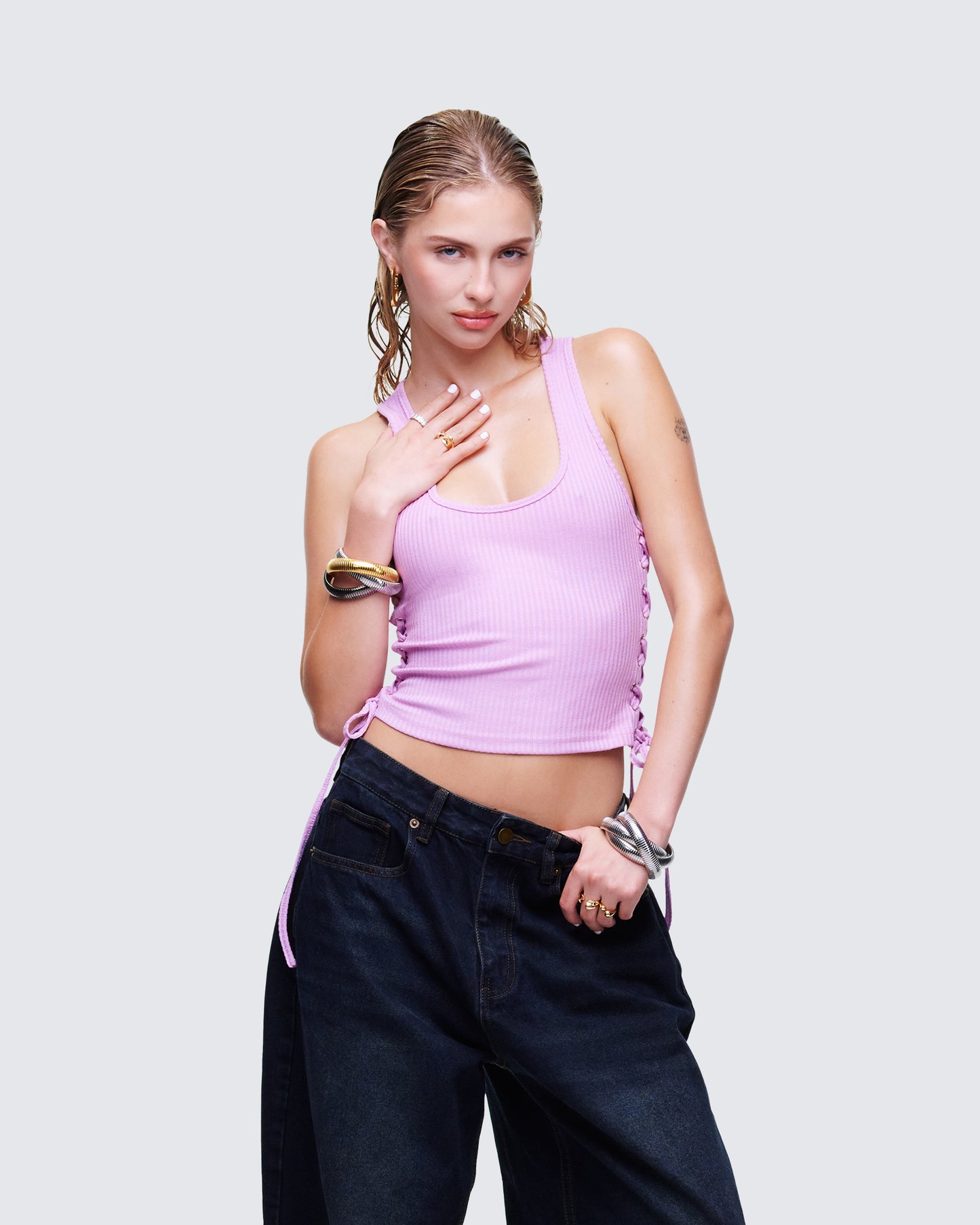 Women's pink tank top styled on model – FINESSE