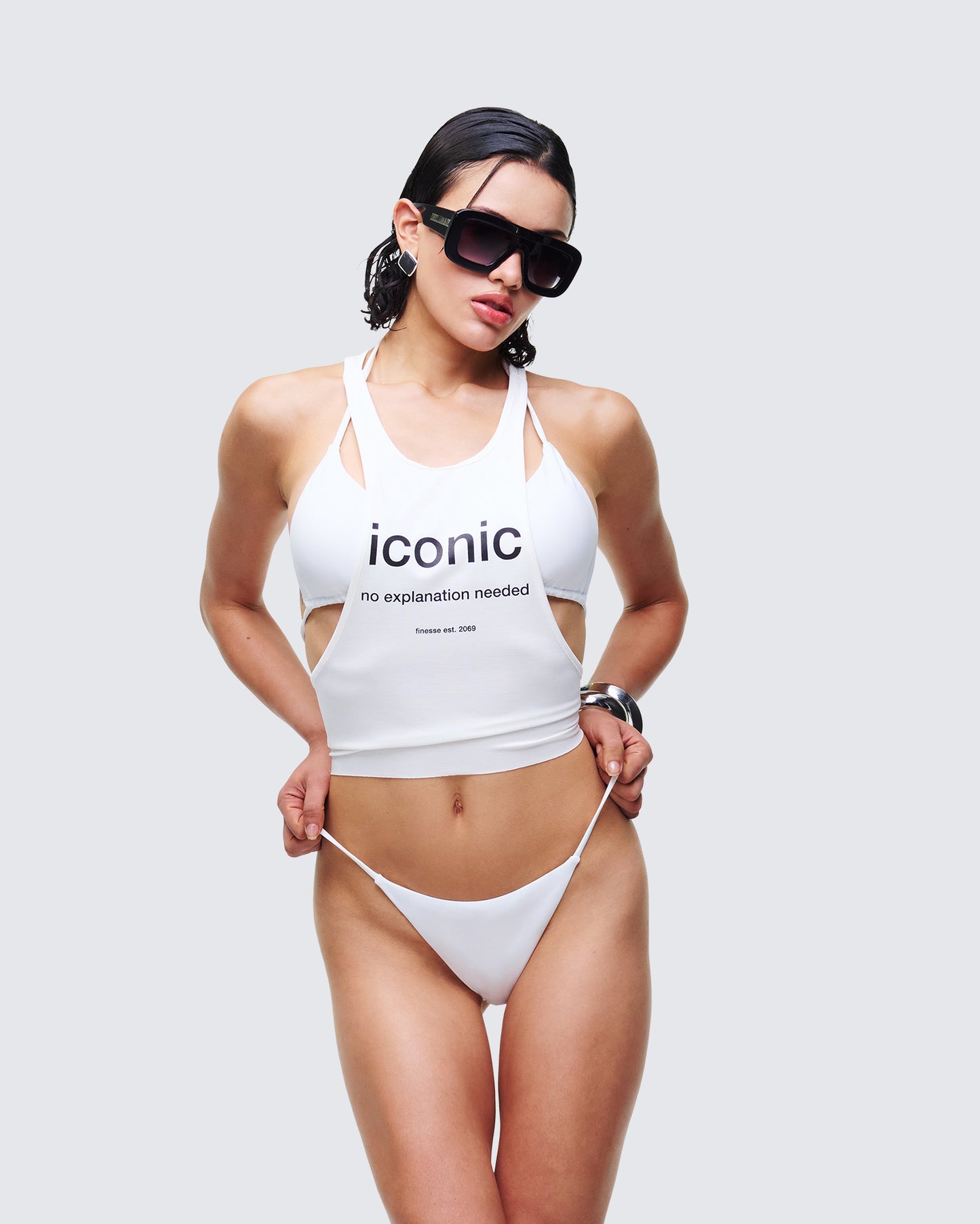 Women's white tank top styled on model – FINESSE