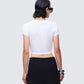 Women's white cotton top close-up detail – FINESSE