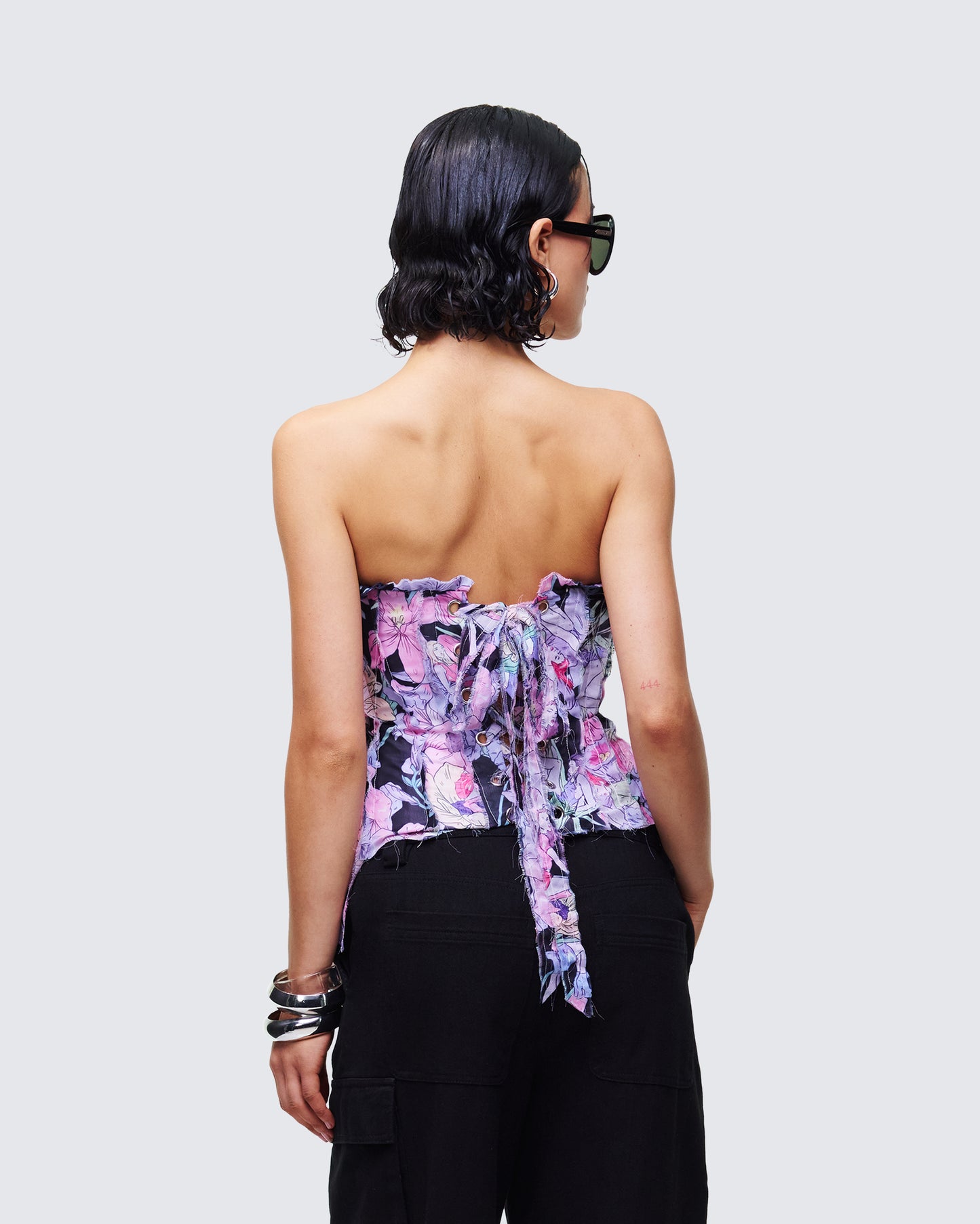 Women's black corset top close-up detail – FINESSE