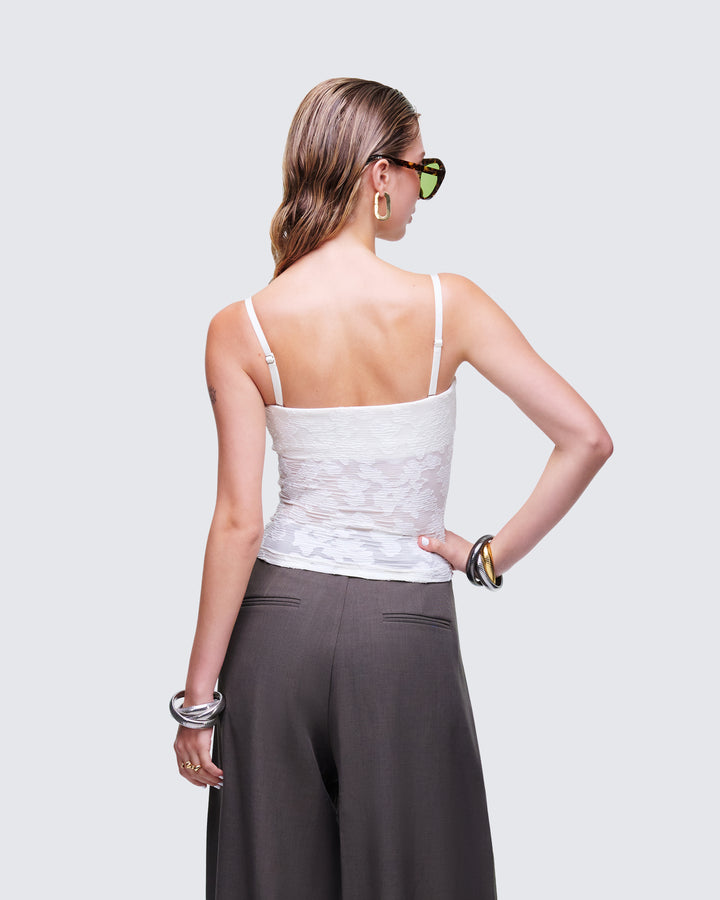 Women's white top close-up detail – FINESSE