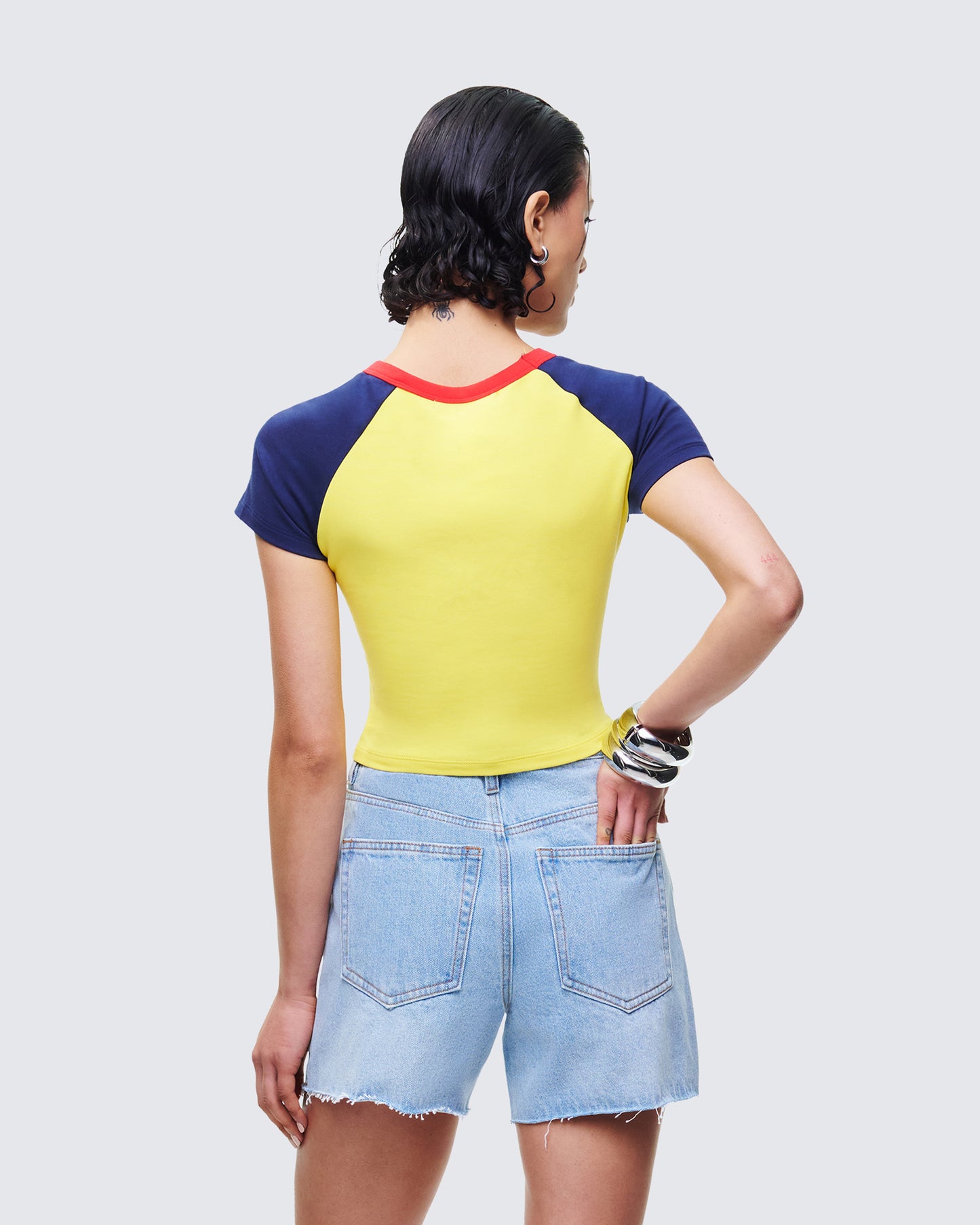 Women's yellow cotton top close-up detail – FINESSE