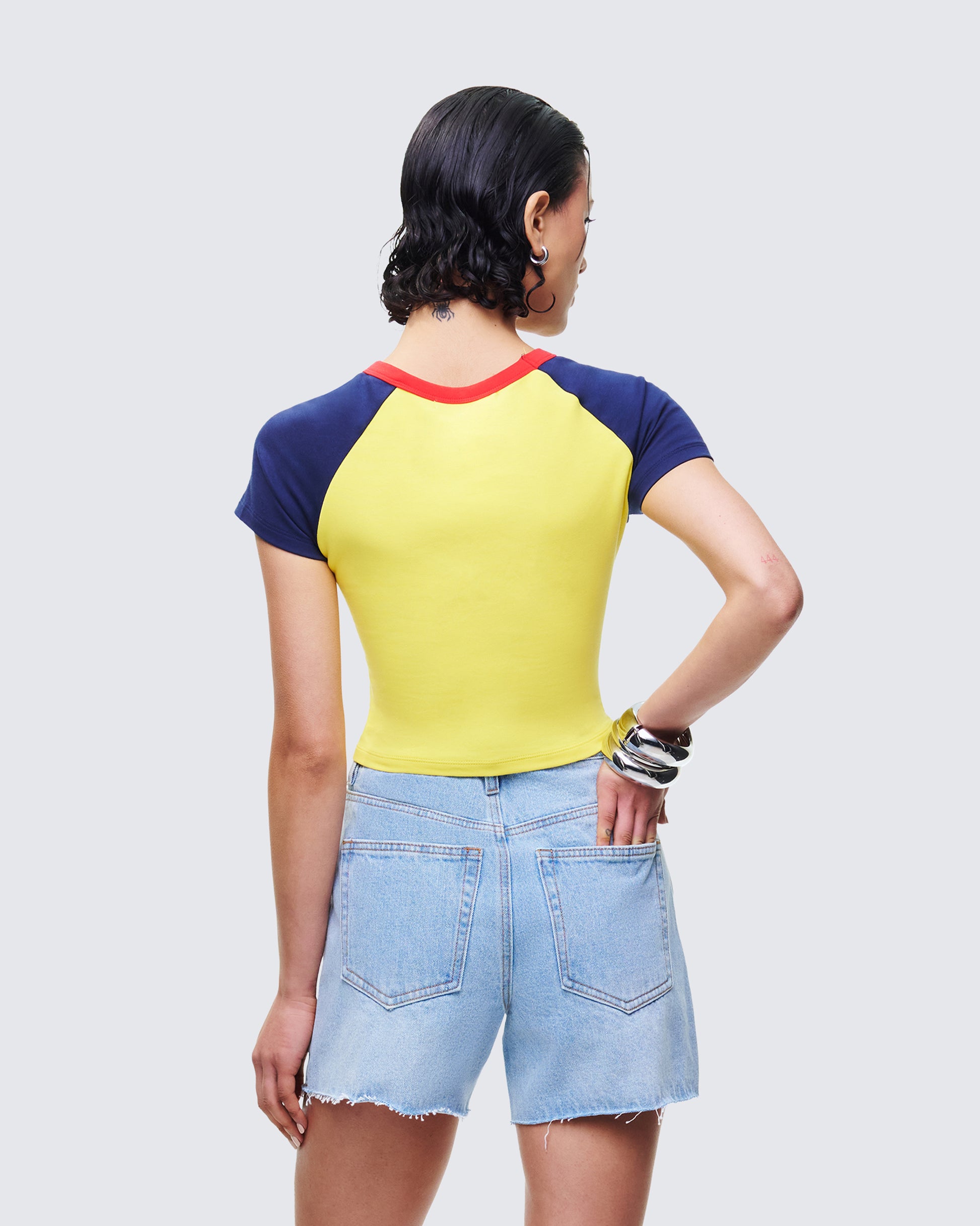 Women's yellow cotton top close-up detail – FINESSE