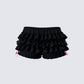 Women's black cotton shorts styled on model – FINESSE