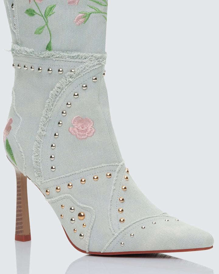 Women's red boots close-up detail – FINESSE