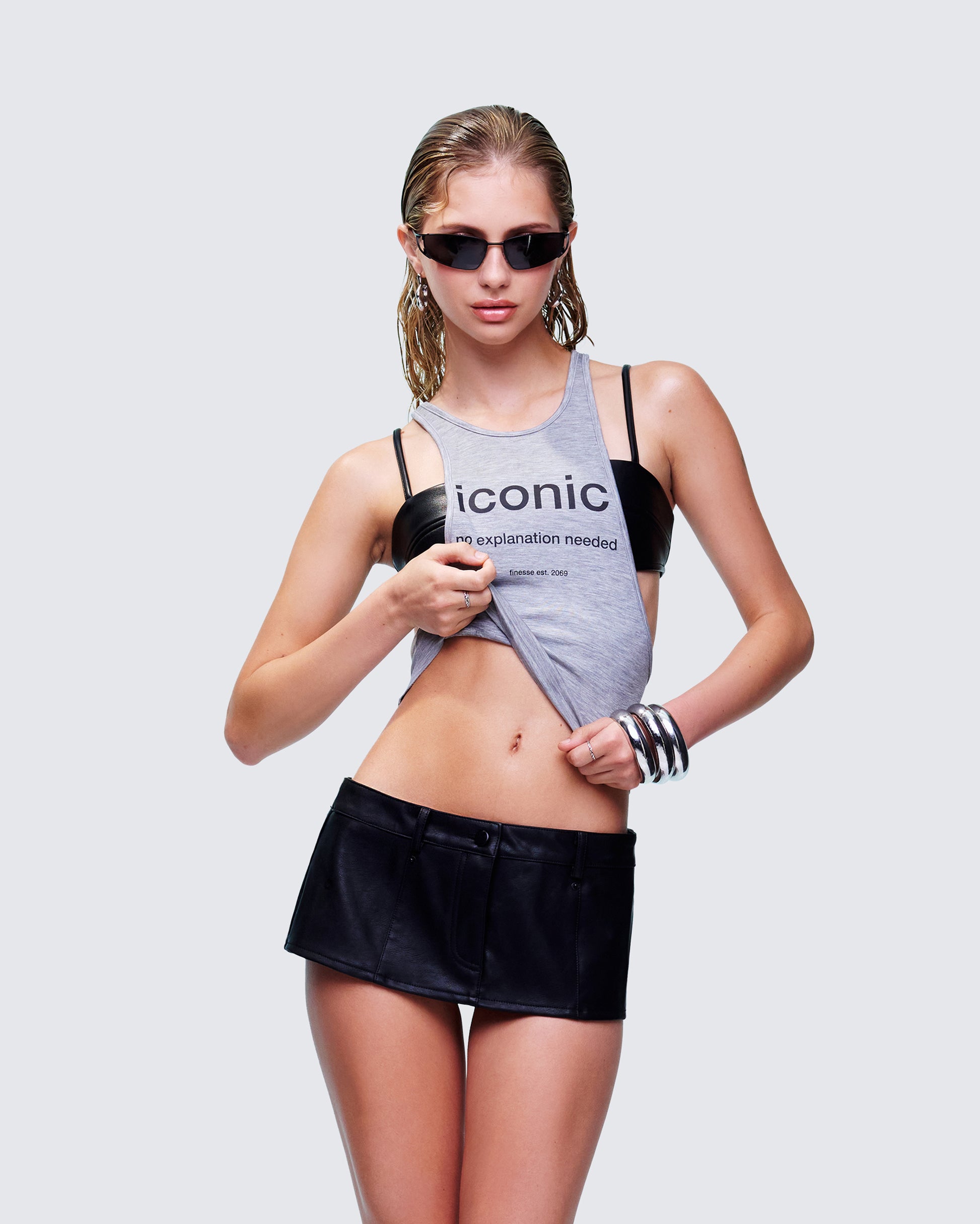 Women's grey tank top styled on model – FINESSE