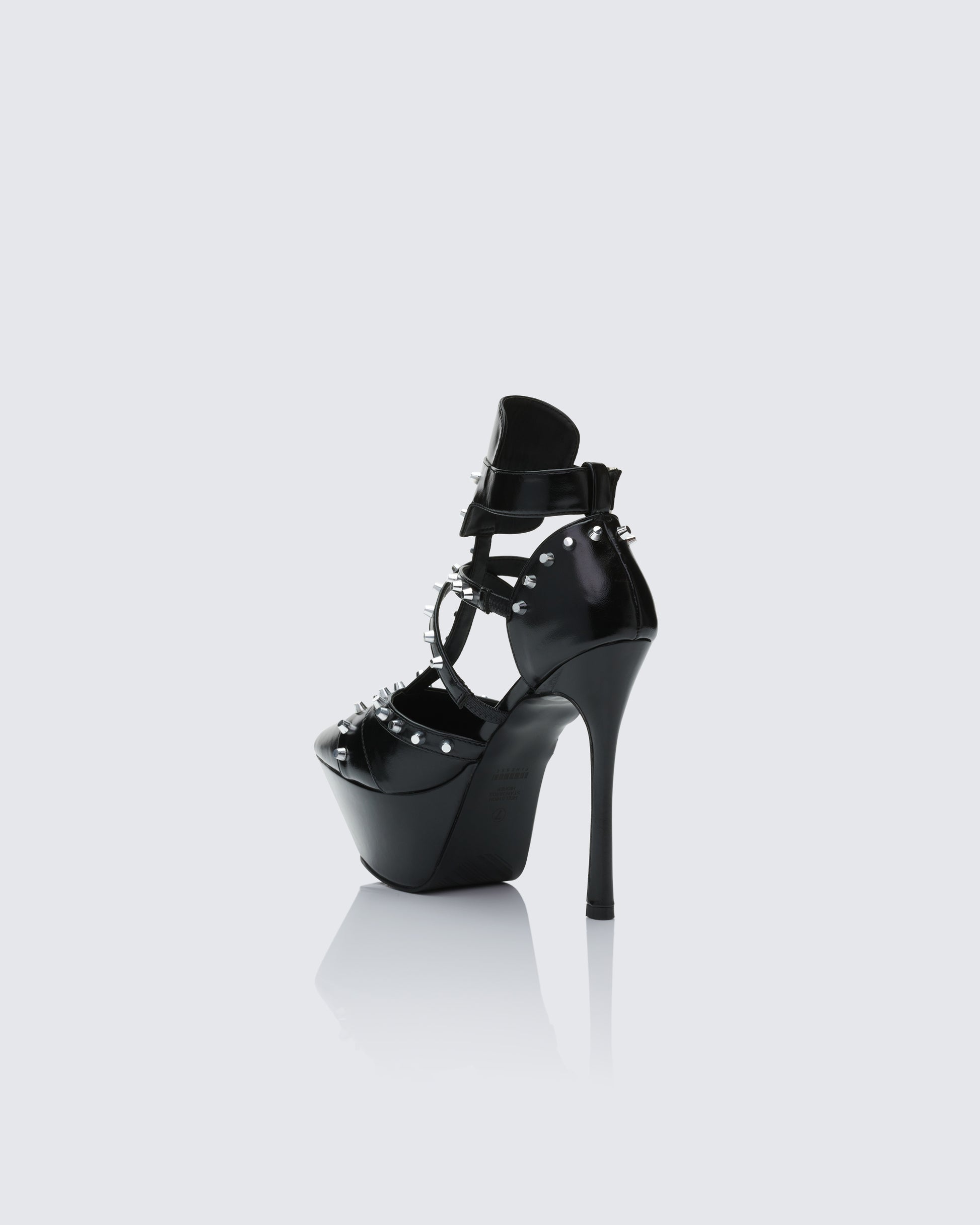 Women's black heels styled on model – FINESSE