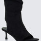 Women's black boots close-up detail – FINESSE